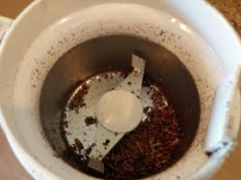 grinding dried vanilla bean pods