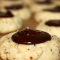 gluten free hazelnut thumbprint cookie