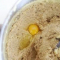 adding an egg to creamed butter and sugars