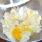 adding eggs to shortening sugar mixture.