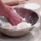 sheeting the butter into the dry ingredients