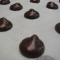 gluten free whoopie pie batter piped onto sheet tray