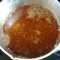 simmering orange syrup mixture